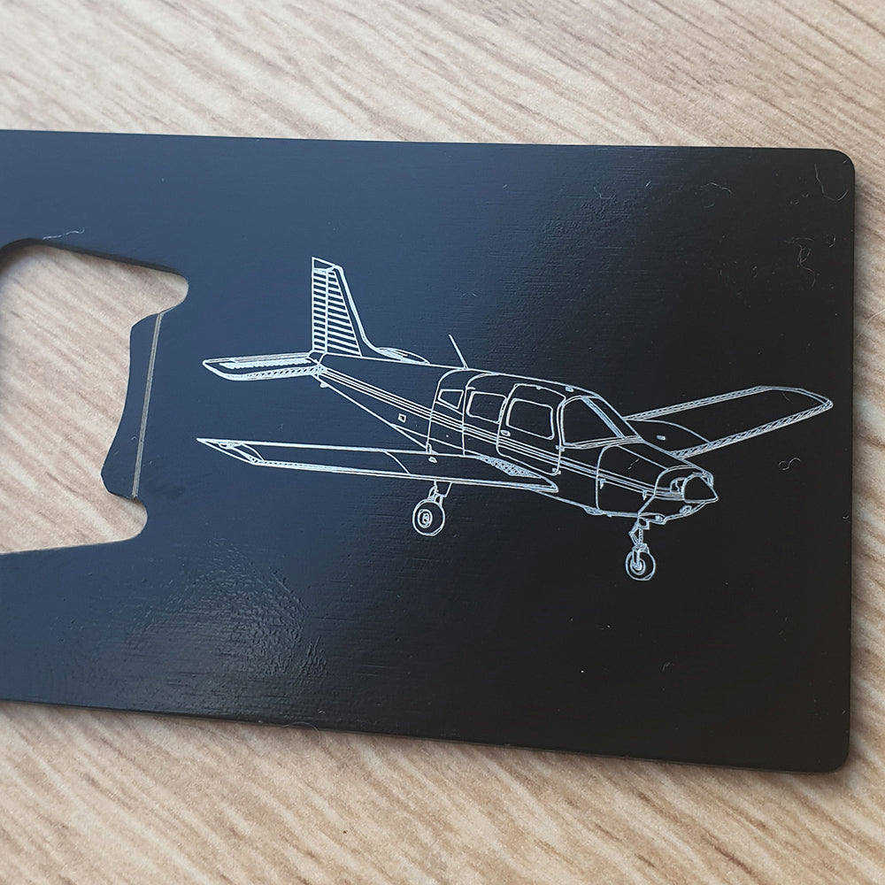 Our Piper PA28 aircraft design engraved on black bottle opener