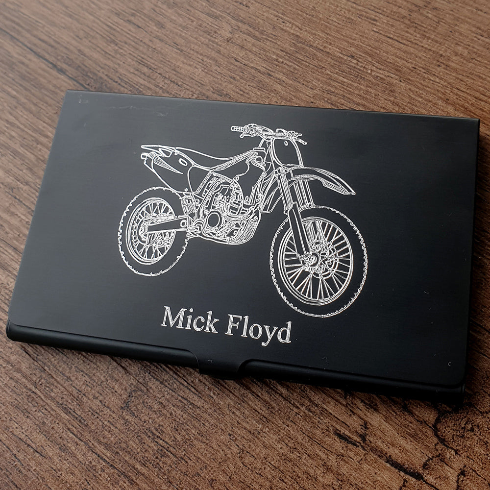 Our Motocross bike design engraved on black business card case with name engraved below