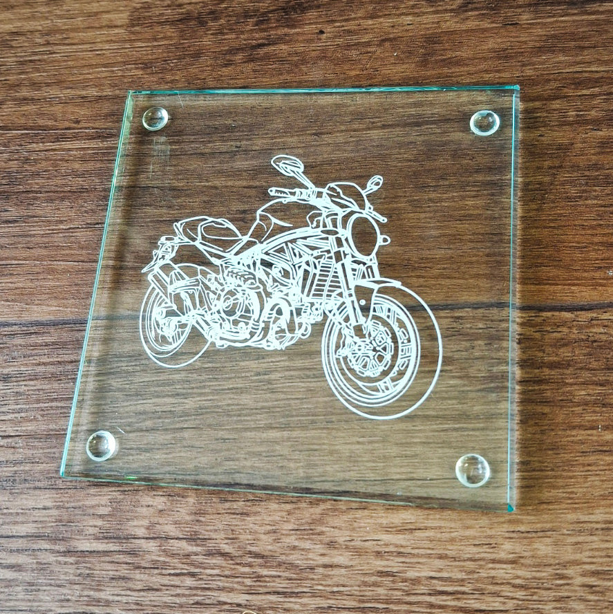 Monster Motorcycle artwork on a square glass drinsk coaster