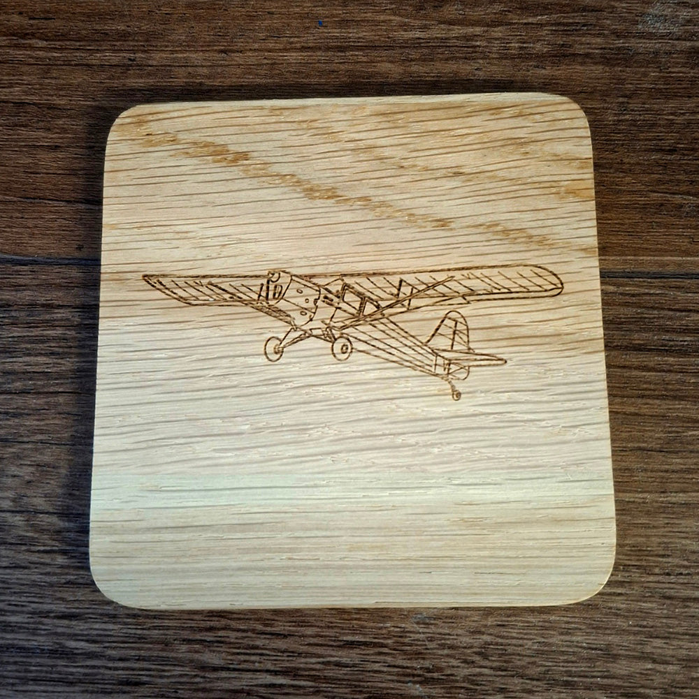 Auster j series artwork engraved on wooden coaster