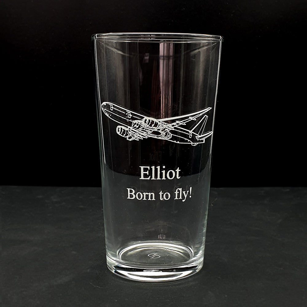 Boeing 777 Aircraft Beer Glass with a name and Born to Fly engraved beneath.