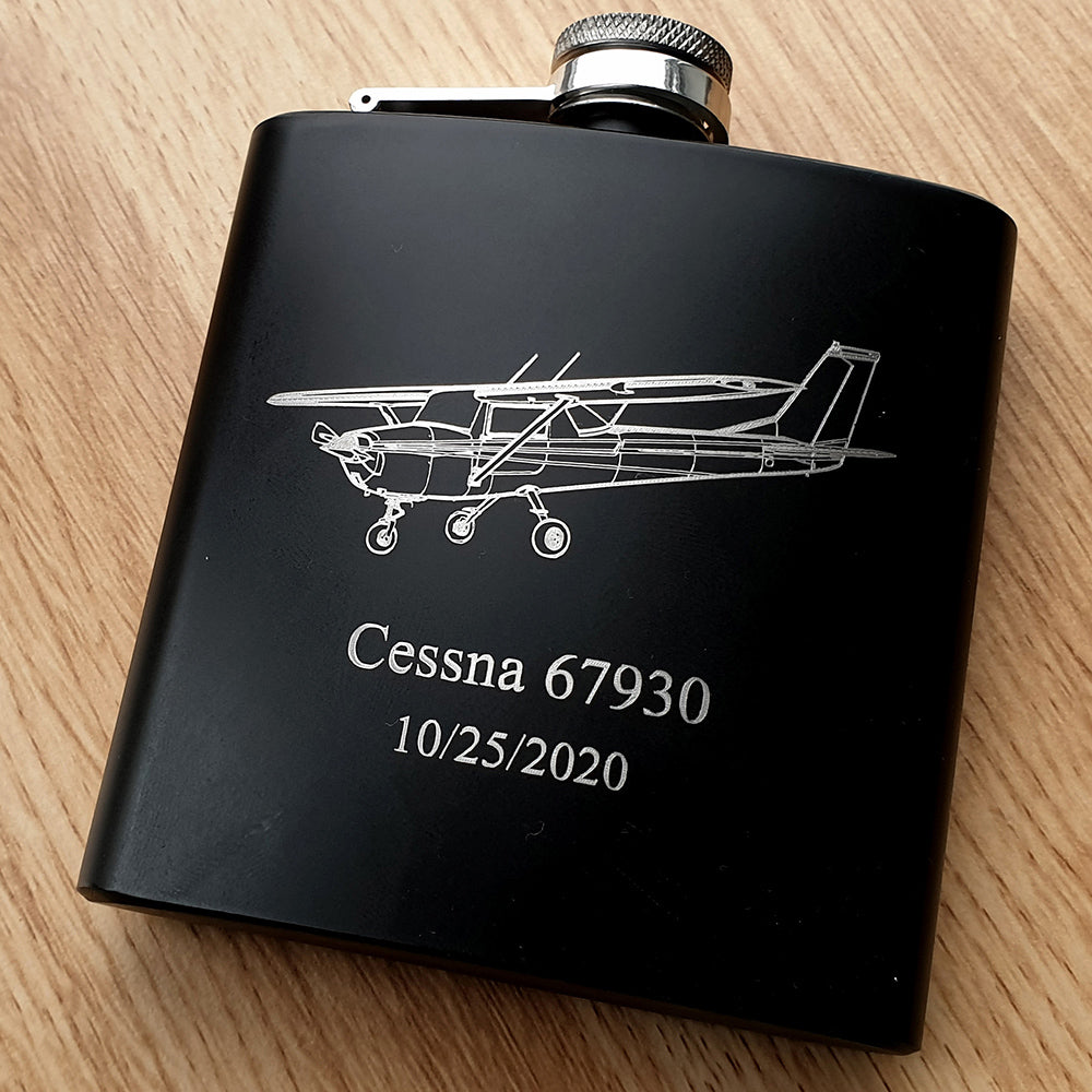 Cessna 152 Artwork engraved om Black coated Hip Flask with additional personalisation.