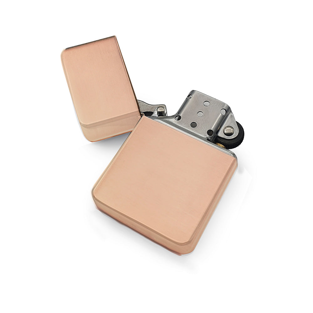 Rose Gold petrol lighter with a metallic finish on a white background