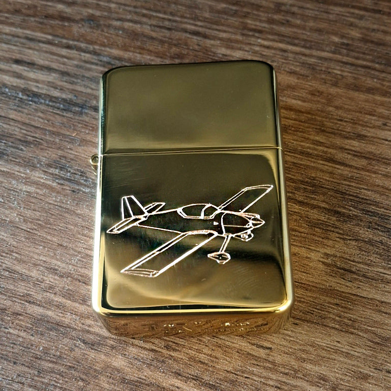 Brass lighter engraved with our Vans RV 6 aircraft deisgn