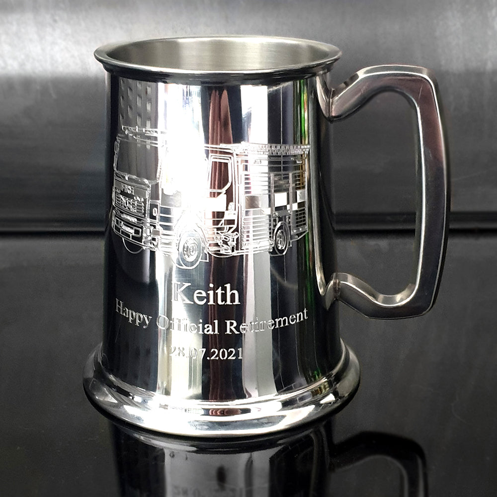 Fire engine artwork engraved on a pewter tankard