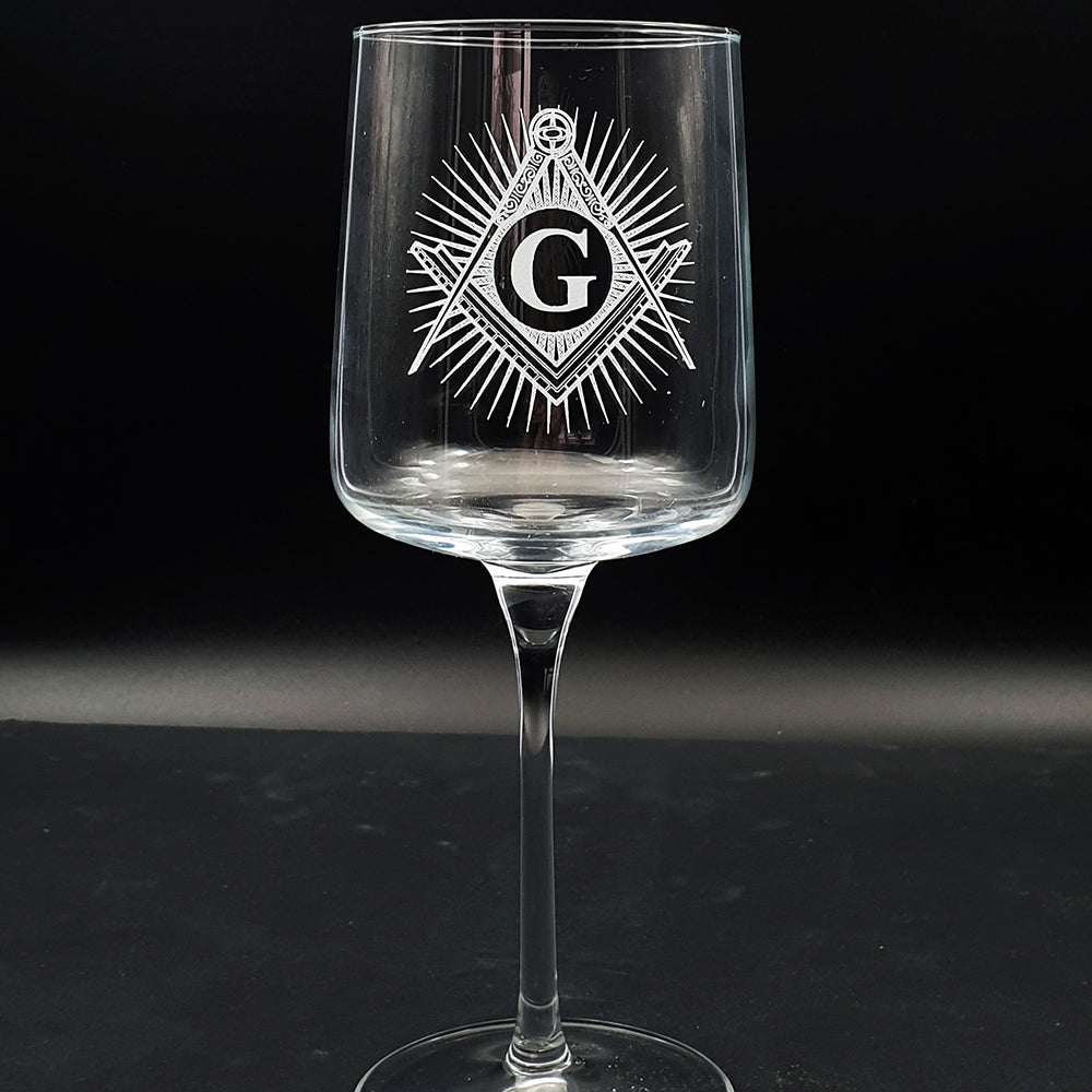 Masonic compass and square starburst background Iconic wine glass