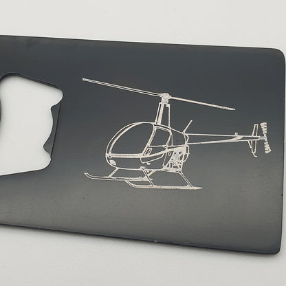 Robinson R22 helicopter artwork engraved on black bottle opener on white background
