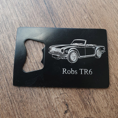 Classic TR6 car artwork engraved on Black Bottle Opener with Robs TR6 underneath.
