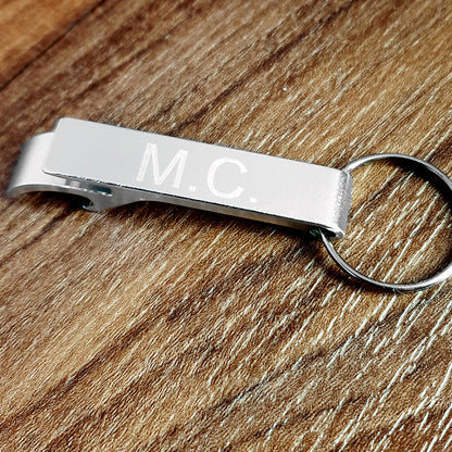 metal bottle opener keyring with M.C. engraved