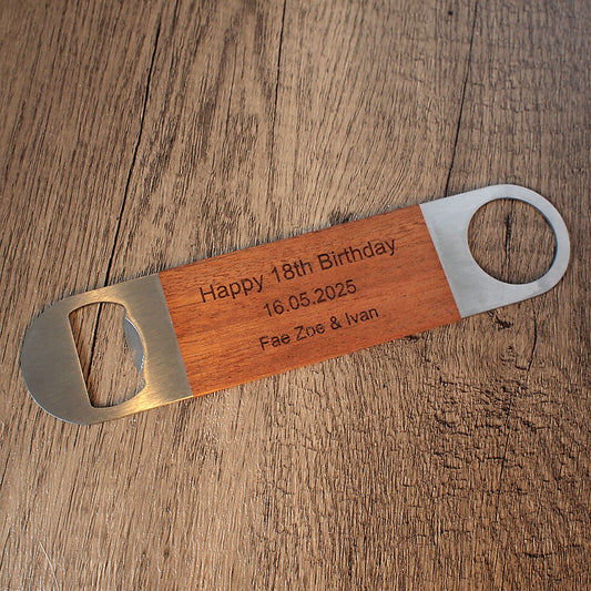 Wood Wrapped bartenders bottle opener with engraved text on the wood.