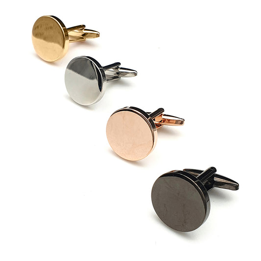 Set of round cufflinks in gold, silver, rose gold, and black on a white background