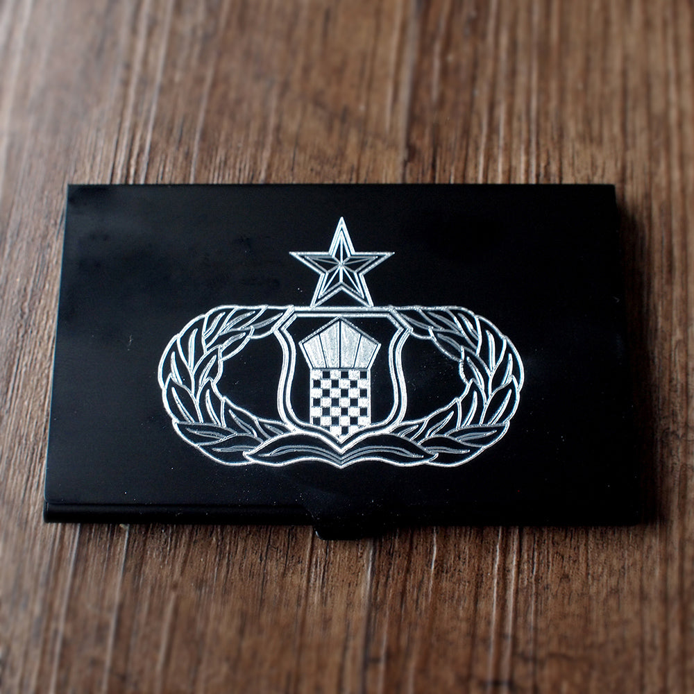 Black card holder with air traffic controller badge engraved