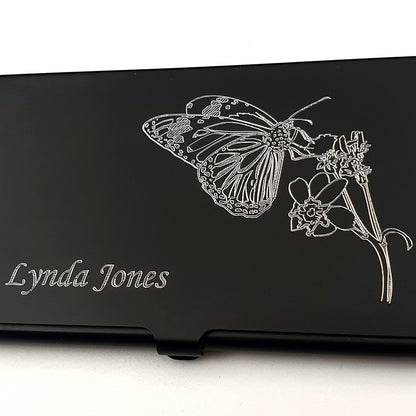 Black Card Holder with Butterfly and plant design on a white background