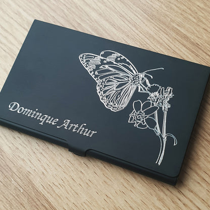 Black Card Holder with Butterfly and plant engraving with name in opposite corner.