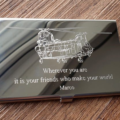 Silver business card case with a chinook artwork and personalised message engraved on the front.