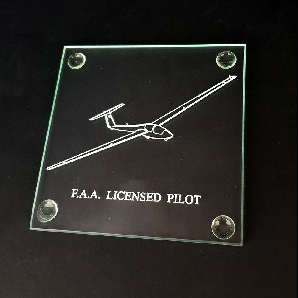 Glass plaque with glider engraving and 'F.A.A. Licensed Pilot' text on a black background