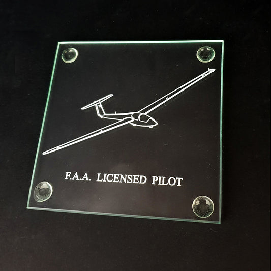 Glass plaque with glider engraving and 'F.A.A. Licensed Pilot' text on a black background