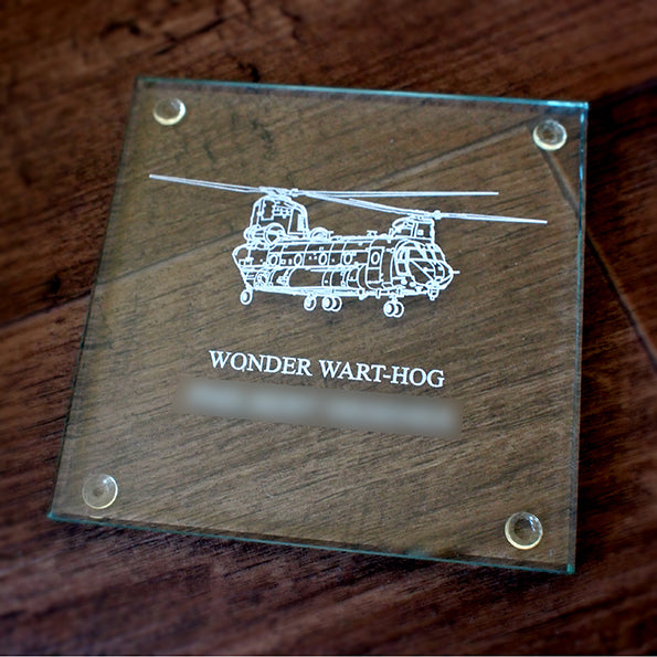 Glass drinks coaster with chinook helicopter artwork engraved on the front.