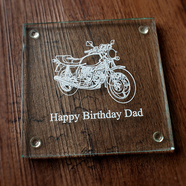 Glass plaque with 900sd motorcycle engraving and 'Happy Birthday Dad' text on a wooden surface