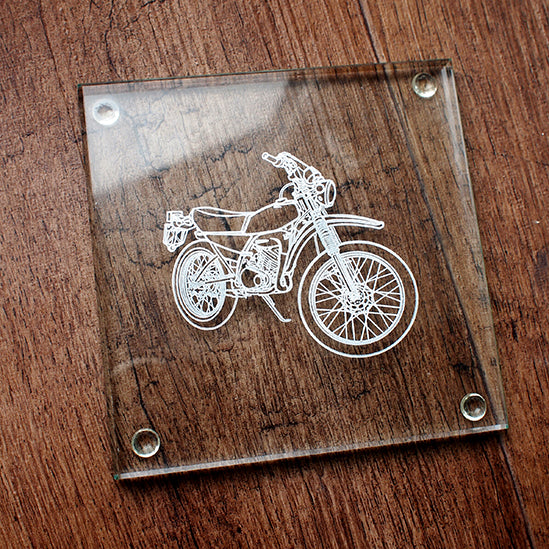 DT125 motorcycle on a square glass drinsk coaster