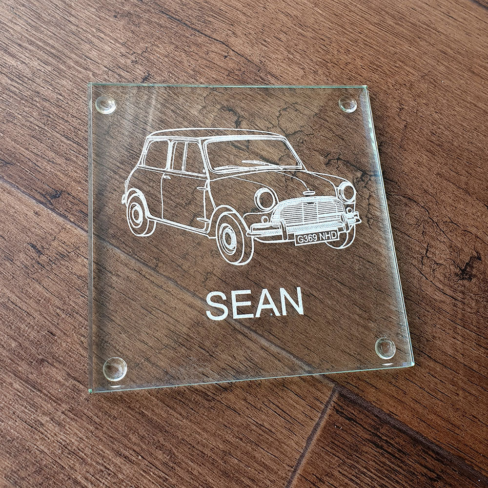 Glass coaster with a classic mini car engraving and the name 'SEAN'