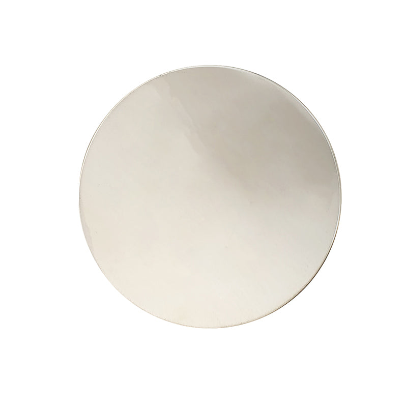 Round pewter drinks coaster shown from above on white background