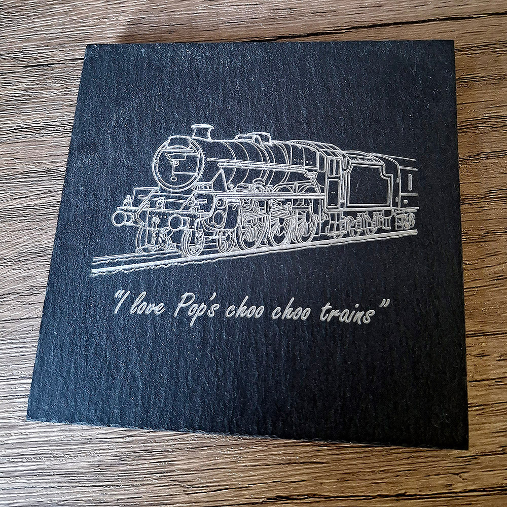 Square black slate drinks coaster engraved with our Steam train locomotive artwork and personalised text requested by the customer.