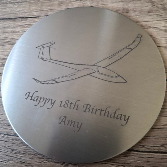 Discus glider with birthday message engraved on round steel drinsk coaster
