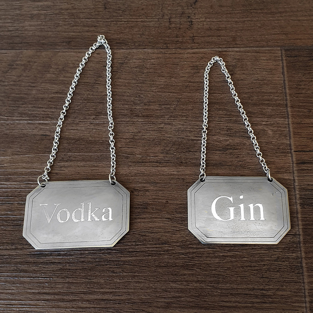 pair pewter oblong decanter bottle label engraved with vodka and gin