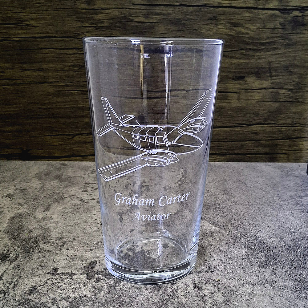 A Conical Pint Glass engraved with our Piper PA34 Seneca Aircraft Artwork and name personalisation.