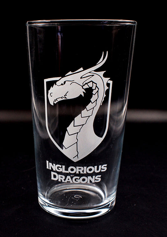 Conical beer glass with 'Inglorious Dragons' logo on a black background