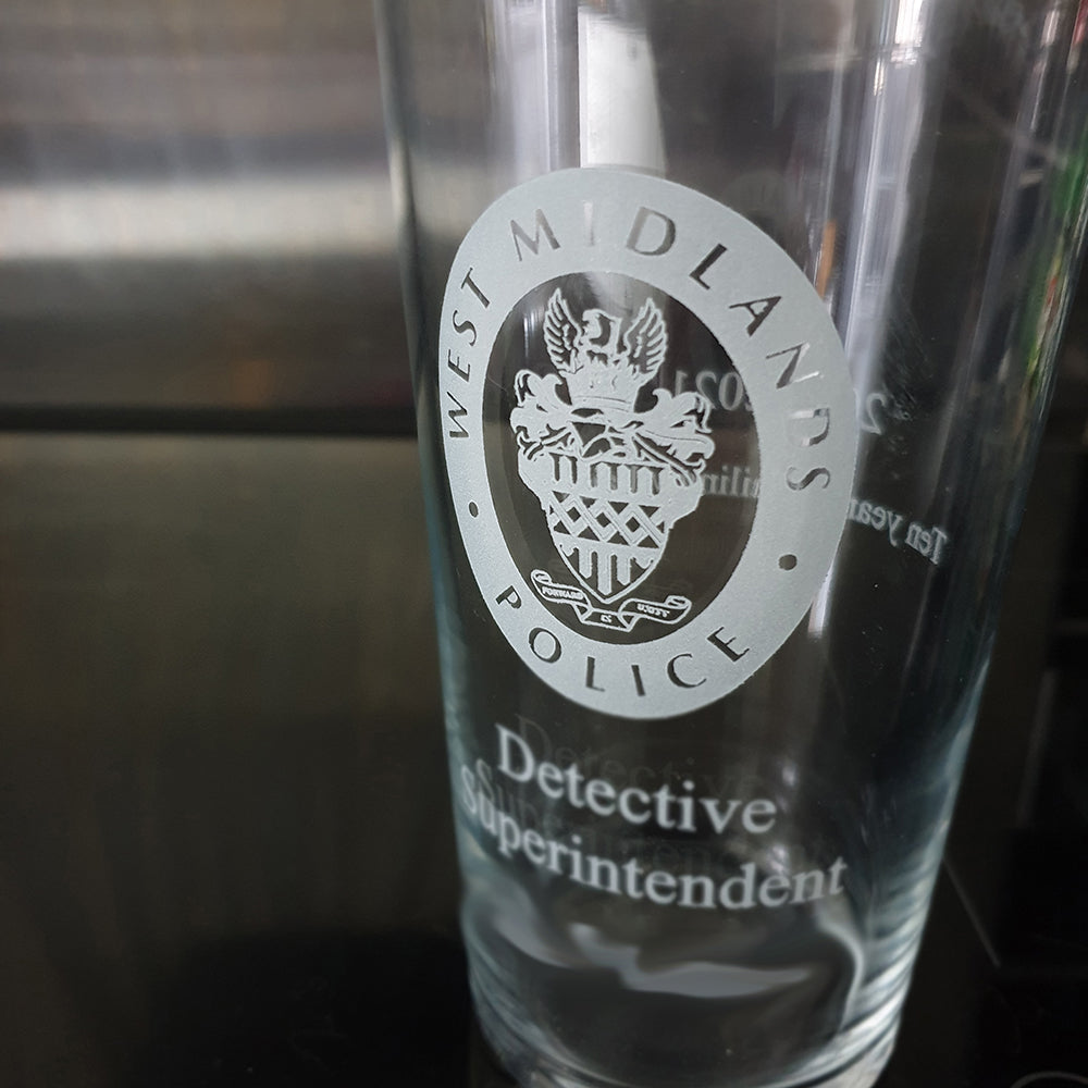 Conical beer glass with West Midlands Police logo 