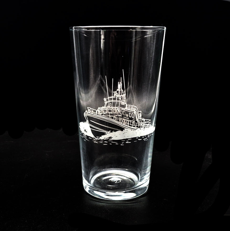 Lifeboat engraved on a beer glass against a black background