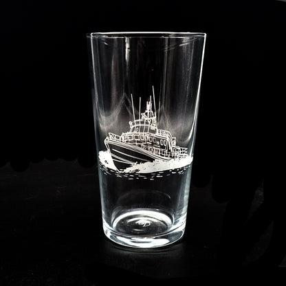 Lifeboat engraved on a beer glass against a black background