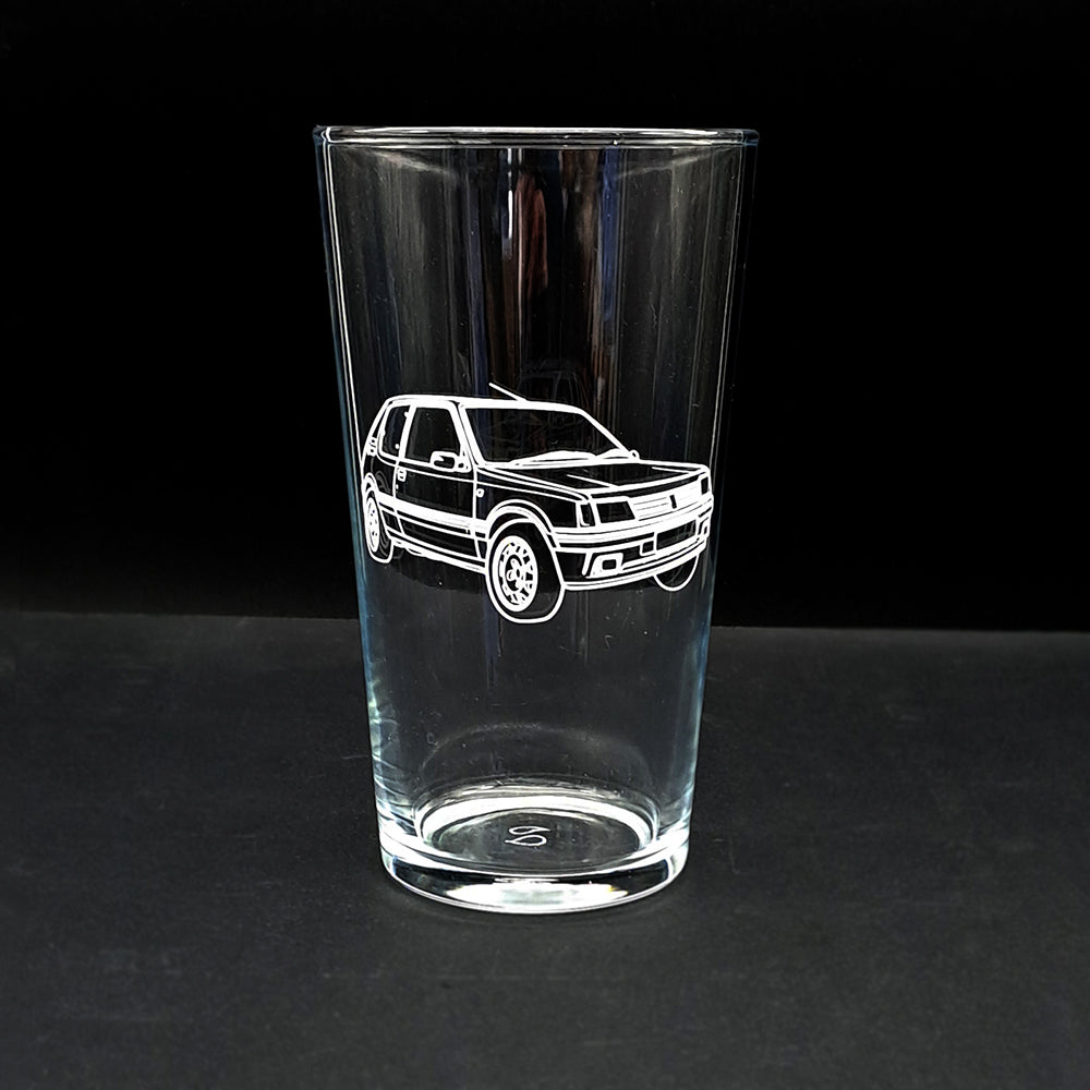 Pug 205 Car engraved on a conical beer glass.