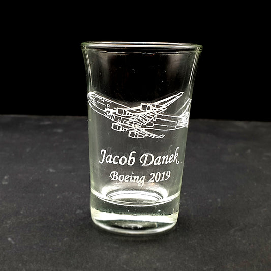 Essence shot glass engraved with text and Boeing 747 artwork