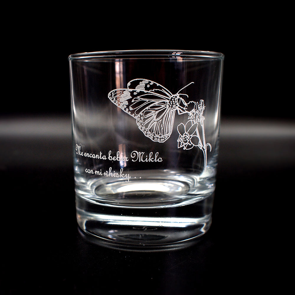 our Butterfly and plant artwork engraved on glass tumbler with message engraved to the side.