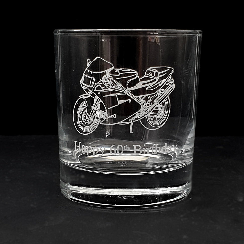 Duc 888 motorcycle on a glass tumbler with Happy 60th Birthday engraved underneath.