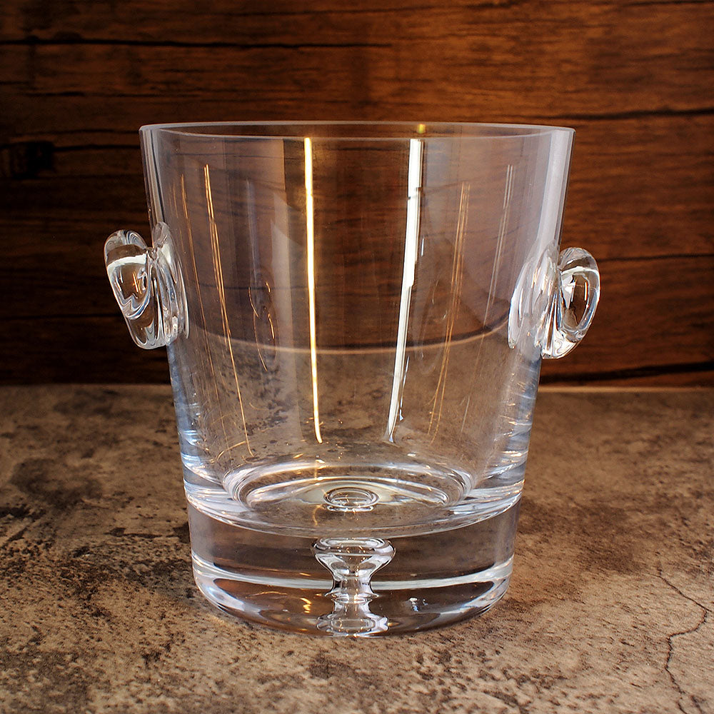 Hand made bubble base glass ice bucket shown the from the front empty.