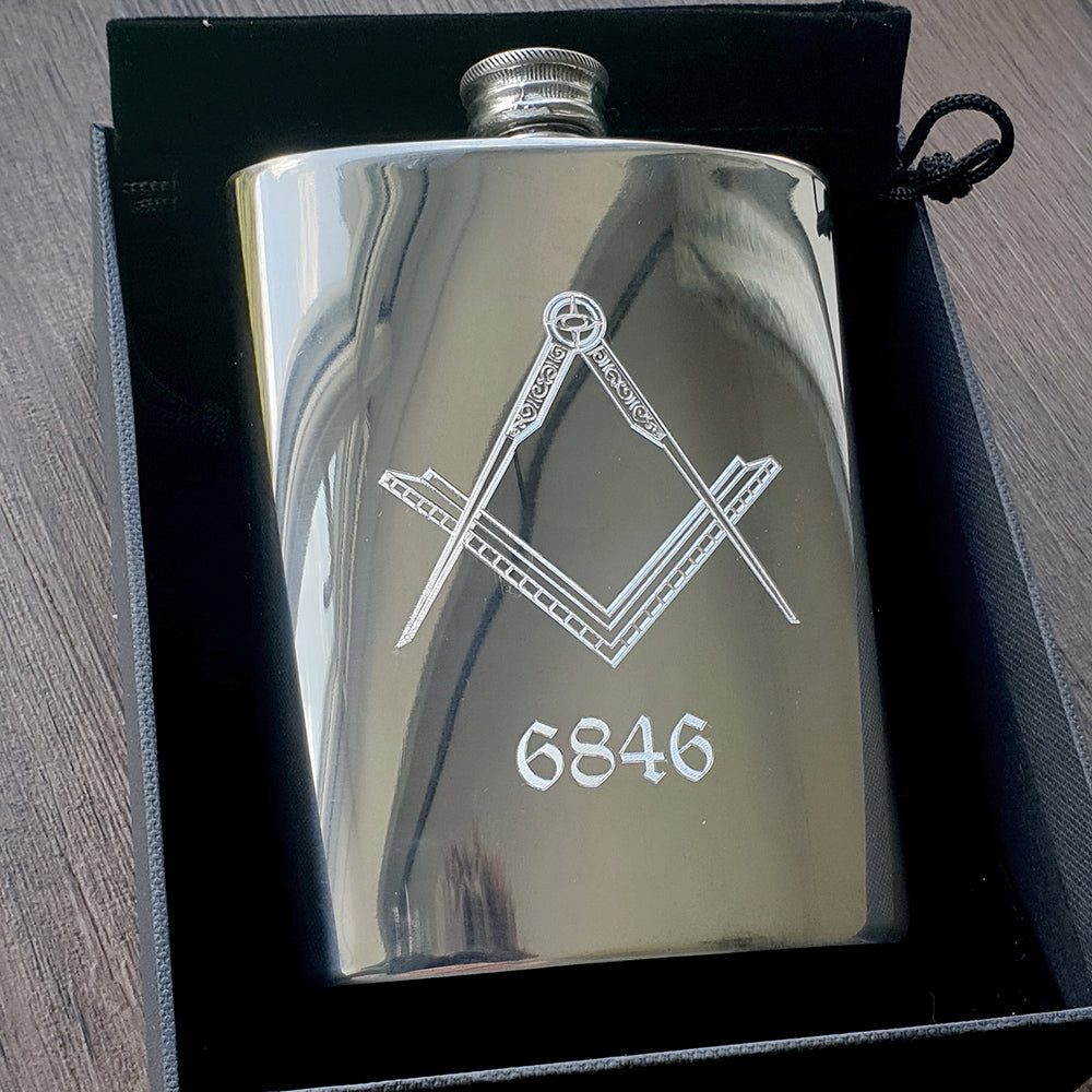 Compass and set square masonic logo with lodge number engraved on the front of a 6oz pewter hip flask