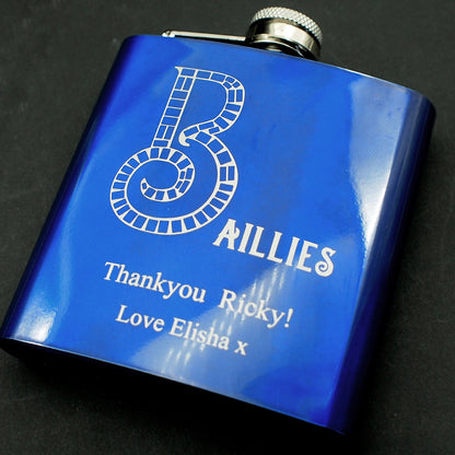 Blue flask with 'Baillies' branding and personalized text on a dark background