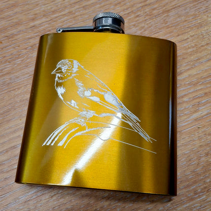 Gold Fitch Bird artwork engraved on a gold coated hip flask