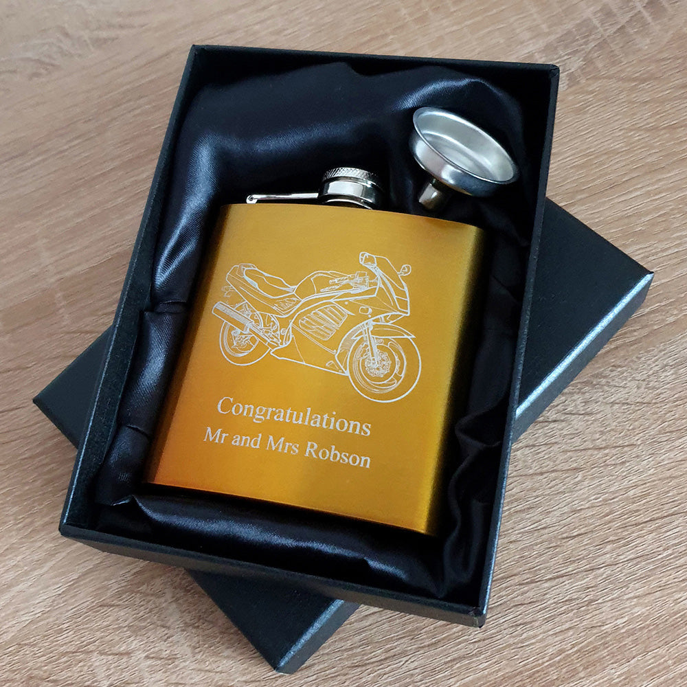 RF Motorcycle artwork engraved on a gold coloured hip flask in a black satin presentation gift box with additional personalisation