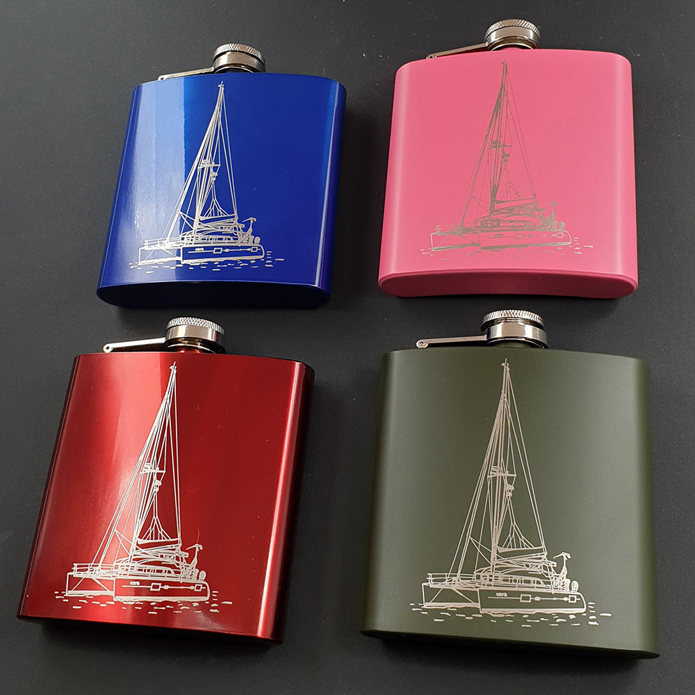 Set of 4 Hip Flasks in different colours engraved with our catamaran artwork.