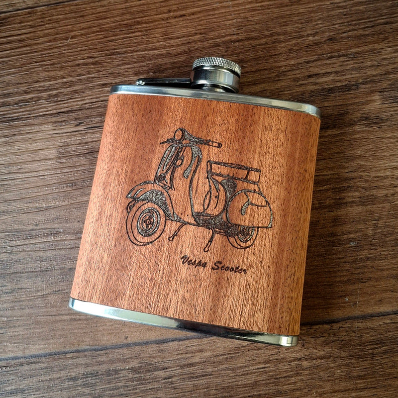Vespa Scooter artwork engraved on a wood wrapped hip flask.
