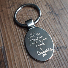 Oval keychain with a childs message engraved