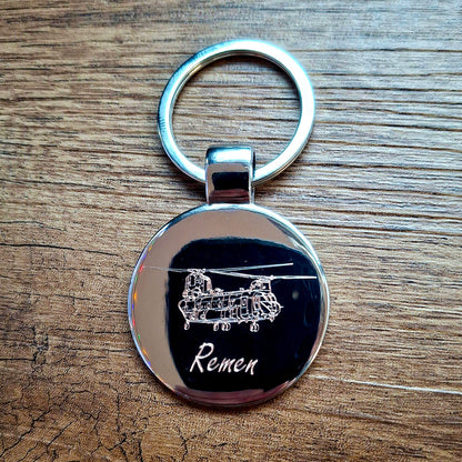 Personalised round keyring with chinook helicopter artwork.