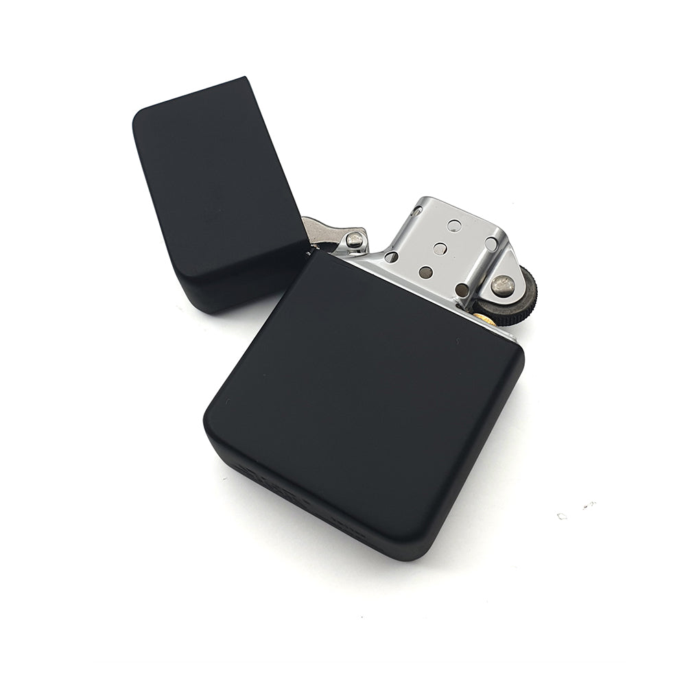 Matt Black petrol lighter with open lid on a white background