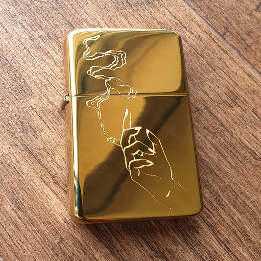 Brass Lighter with a smoking hand image engraved
