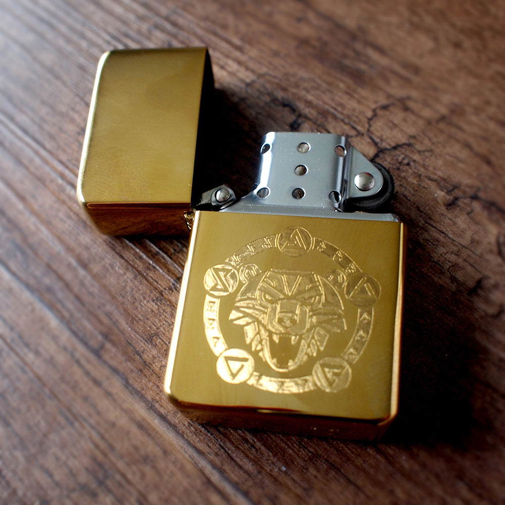 Gold Lion Logo design on a Brass Lighter